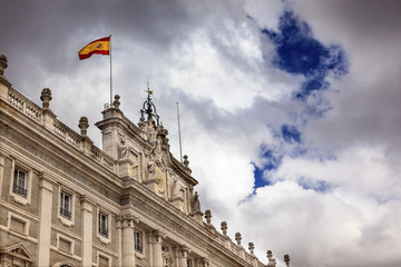 Fototapeta na wymiar Royal Palace Clouds Sky Cityscape Spanish Flag Madrid Spain