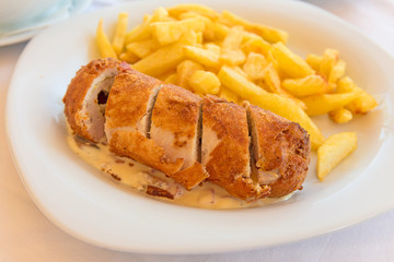 Chicken roll stuffed with vegetables with white sauce and frenc