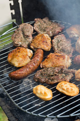 barbecue with delicious grilled meat on grill