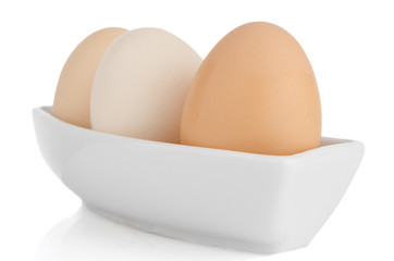 Brown eggs in white ceramic bowl - Powered by Adobe