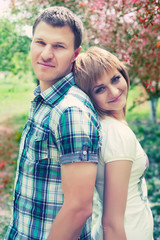 Fototapeta premium Young couple relaxing in park