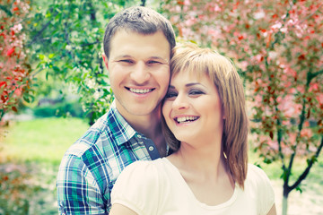 Fototapeta premium Young couple relaxing in park
