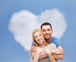 smiling couple hugging