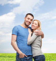 smiling couple hugging