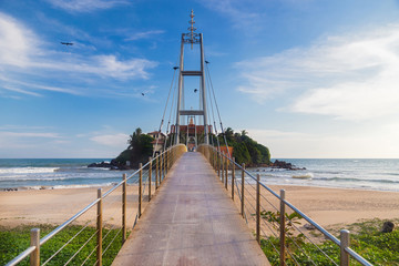 Suspension bridge connecting Pigeon Island, also called Parevi Doowa in Matara, Sri Lanka - obrazy, fototapety, plakaty