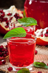 Fresh ripe pomegranate and juice