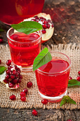 Fresh ripe pomegranate and juice