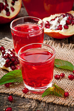 Fresh ripe pomegranate and juice