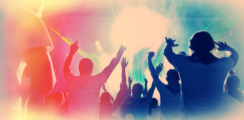 Illumination and Silhouettes of People with Raised Hands in the Night During a Night Concert. Web Banner.  Dj Banner - obrazy, fototapety, plakaty