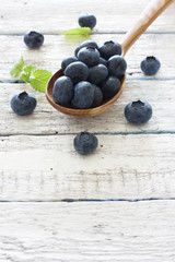 Spoon with blueberries