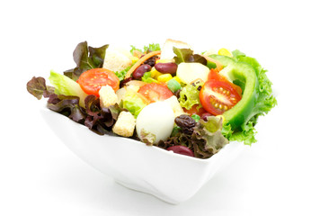 Fresh vegetable salad isolated on white