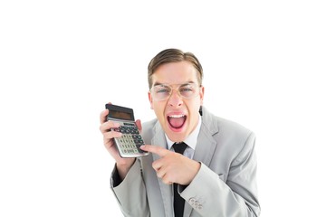 Geeky cheering businessman holding calculator