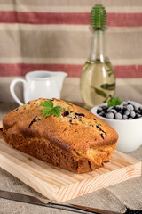 Olive oil cake with yoghurt and black currants