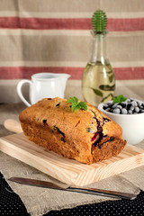 Olive oil cake with yoghurt and black currants