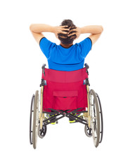 handicapped man sitting on a wheelchair and painful pose