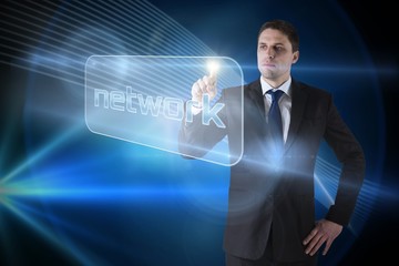 Businessman pointing to word network
