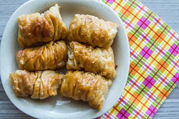 Turkish Pistachio Pastry Dessert in blu Plate 