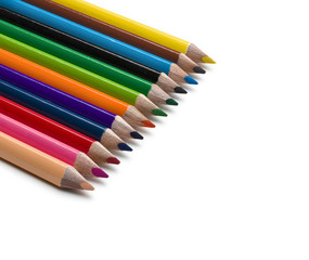 coloured pencils tilted on white