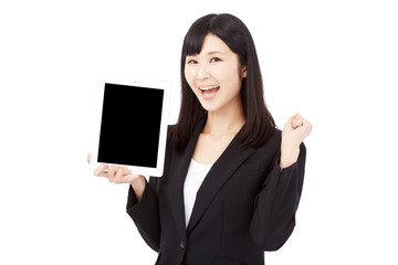 Fototapeta premium タブレットを持ってガッツポーズするビジネスウーマン
