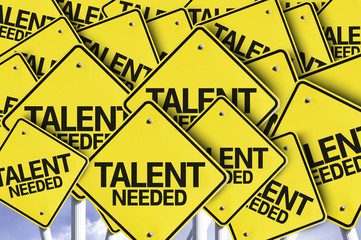 Talent Needed written on multiple road sign