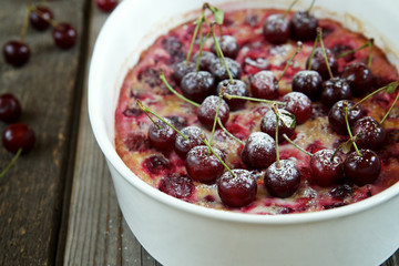 Clafoutis with cherries in the baking dish