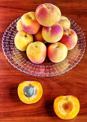 Apricots on wooden table