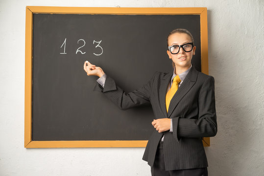 Pupil in the class at the blackboard