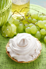 Pavlova cake filled with peach jam