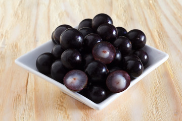 Brazilian berry Jaboticaba in white bowl