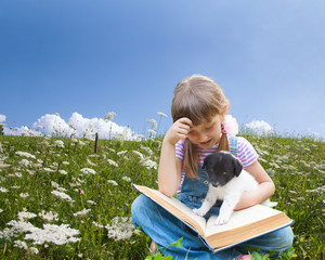 two friends-  little  girl and puppy