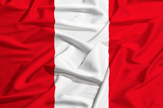 Peru flag on a silk drape waving