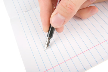 Hand writing on empty notepad (notebook) isolated on white