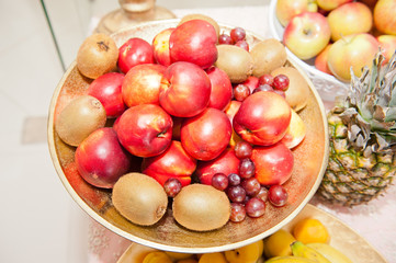 Naklejka na ściany i meble Fruits arrangement. Fresh various fruits elegant decoration