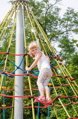 blond girl on playground