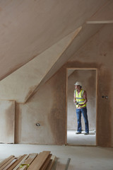 Fototapeta premium Building Inspector Looking At New Property