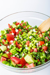 vegetable salad with fresh tomatoes cucumbers and green onions