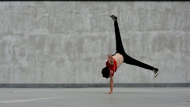 Teenager dancing on the street