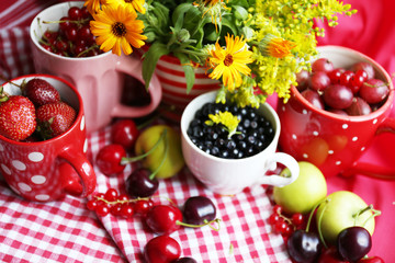Still life with berries and flowers