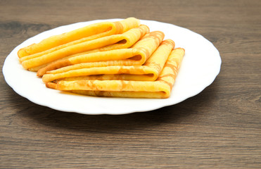 Pancakes on a white plate