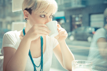 beautiful young blonde short hair hipster woman