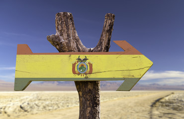 Bolivia wooden sign with a desert background