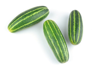 Healthy food. The green cucumbers isolated on white background