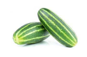 Healthy food. The green cucumbers isolated on white background