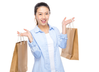 Young woman with shopping bag