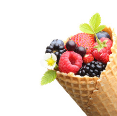 Summer berry fruits in cone.