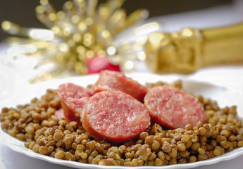 Italian cotechino with lentils on christmas table. - 68272706