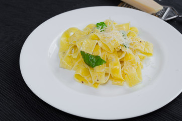 Fresh pappadelle pasta with lemon, basil and creame