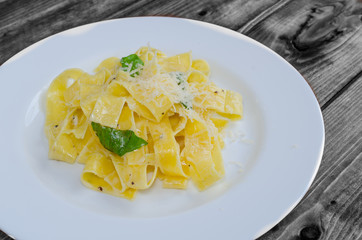 Fresh pappadelle pasta with lemon, basil and creame