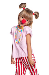 Little girl with clown nose
