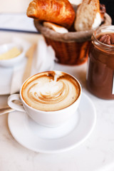 cappuccino with croissants